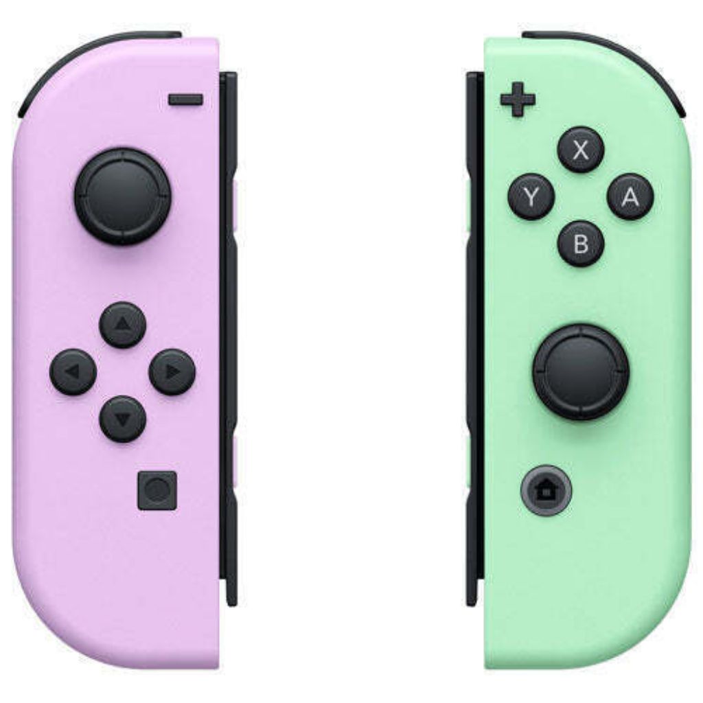 Two gaming controllers, one pink and one green, on a white background