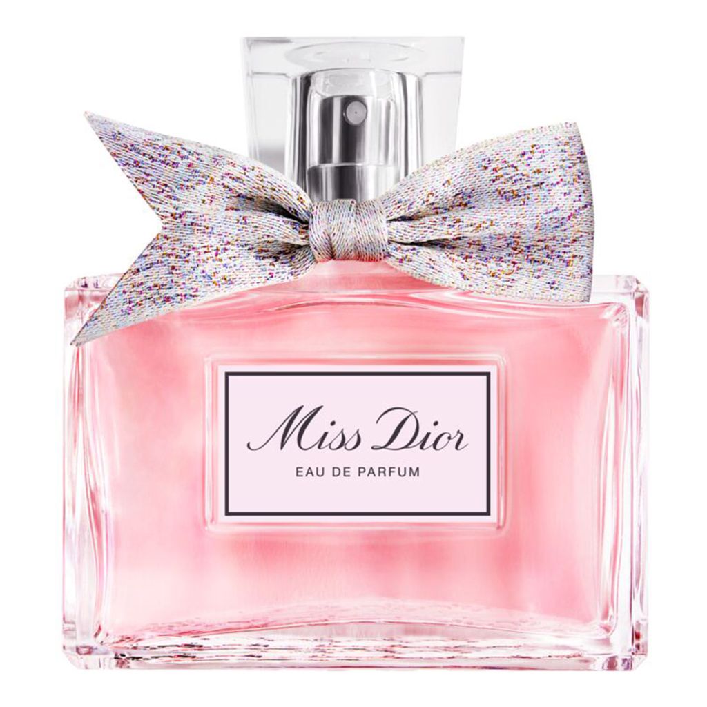 Miss Dior Eau de Parfum bottle with a decorative bow on a white background