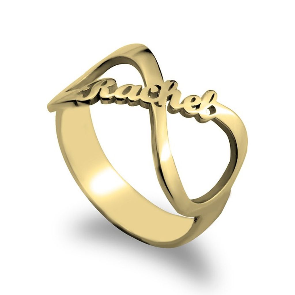 Gold ring with 'Racheal' engraved on a white background