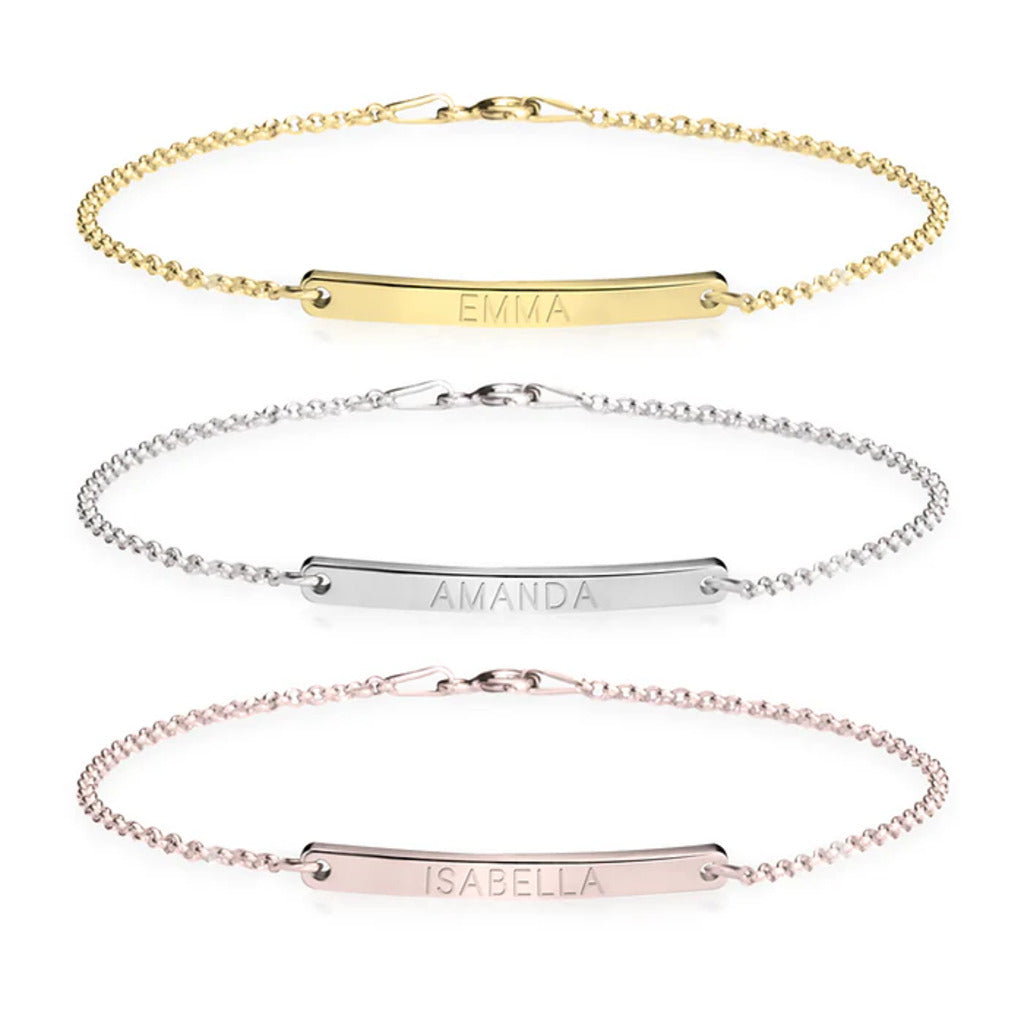 Three gold, silver, and rose gold name bracelets on a white background