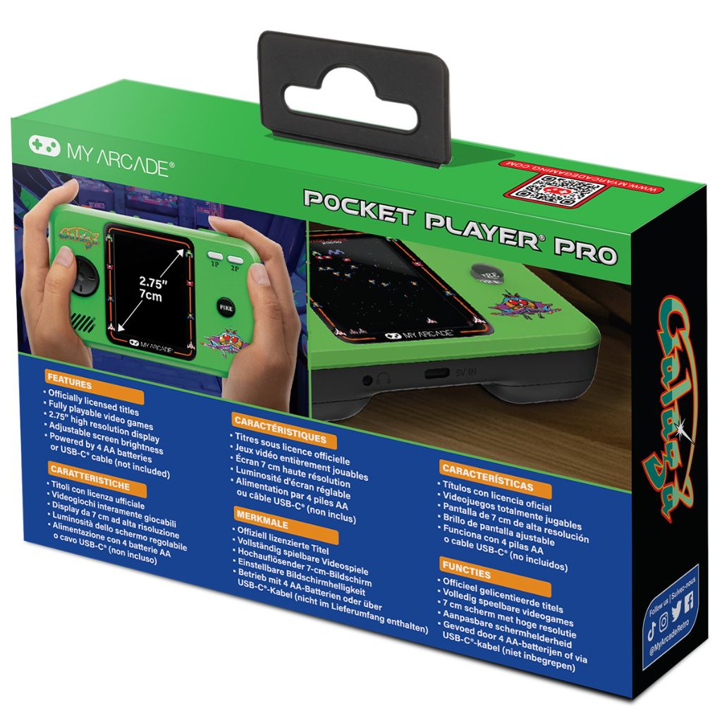 Green and blue packaging of a handheld gaming device with text and images of hands holding the device.