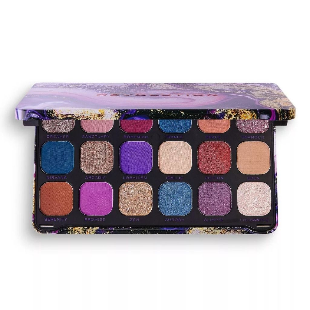 Makeup compact with a colorful marble design and 'Revolution' branding on a white background