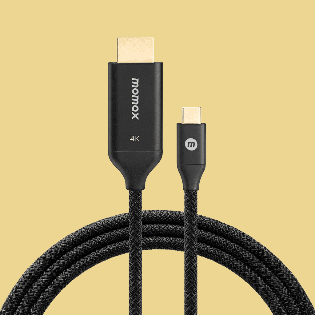 HDMI cable with gold connectors on a beige background