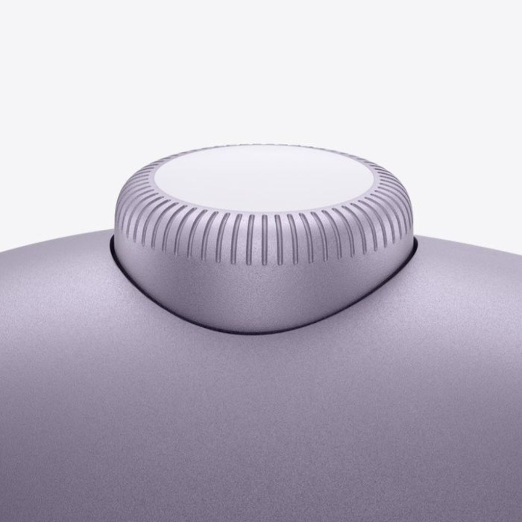 Close-up of a purple electronic device with a circular control knob on a white background