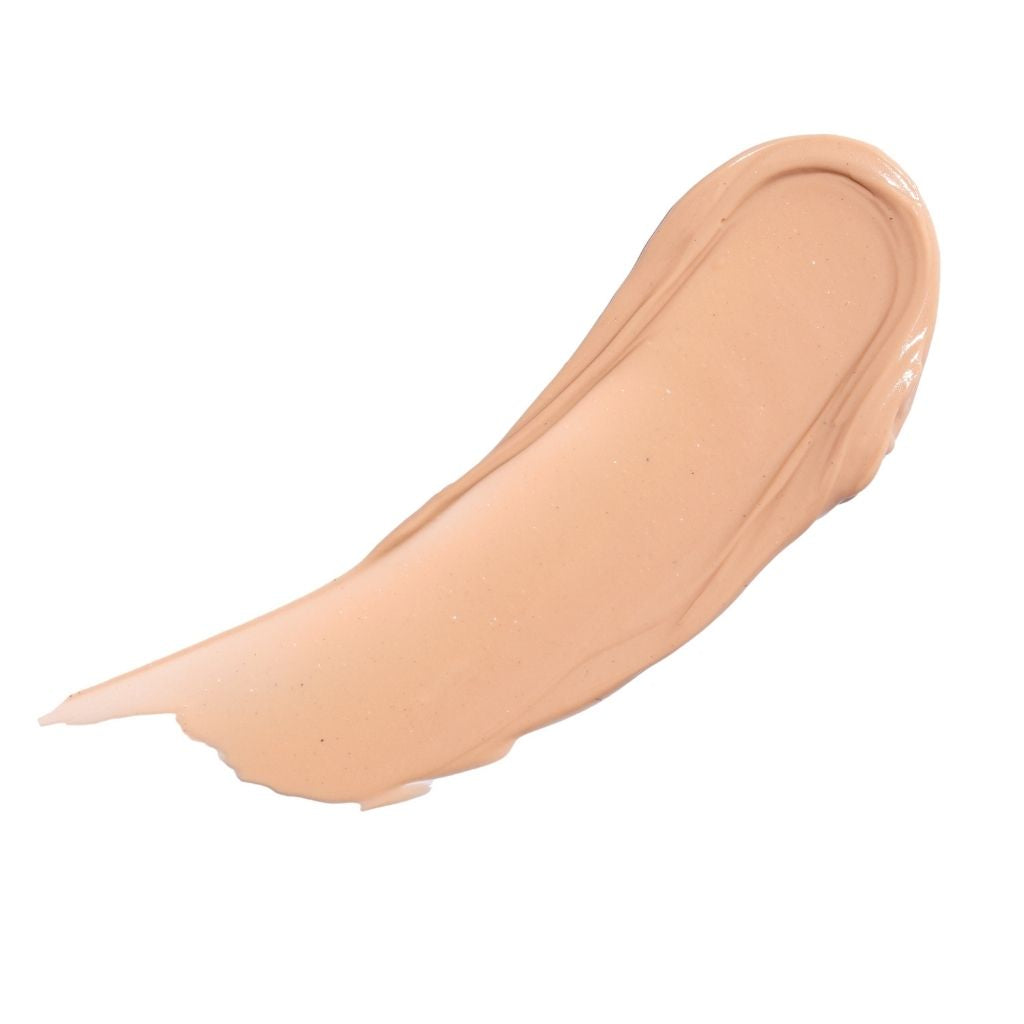Beige makeup swatch on a white background