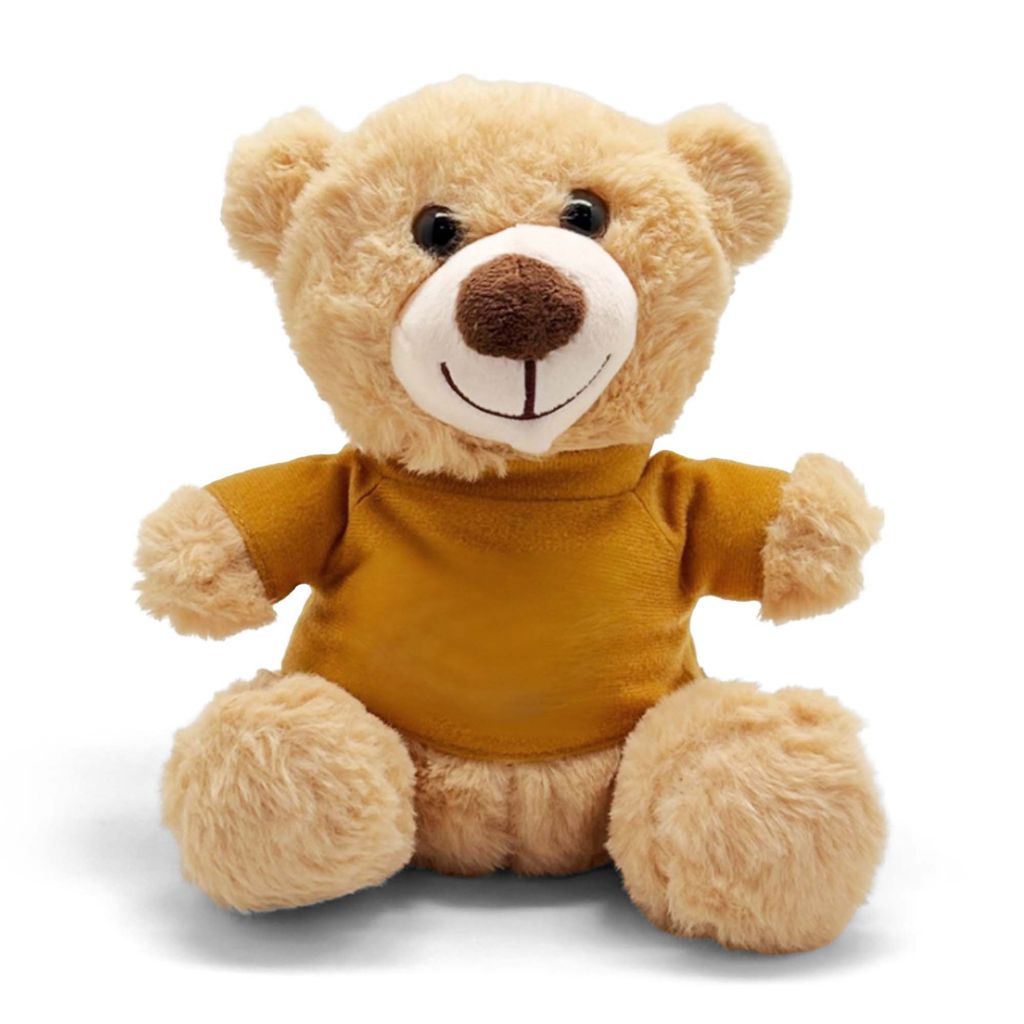 Plush teddy bear wearing a mustard yellow shirt on a white background