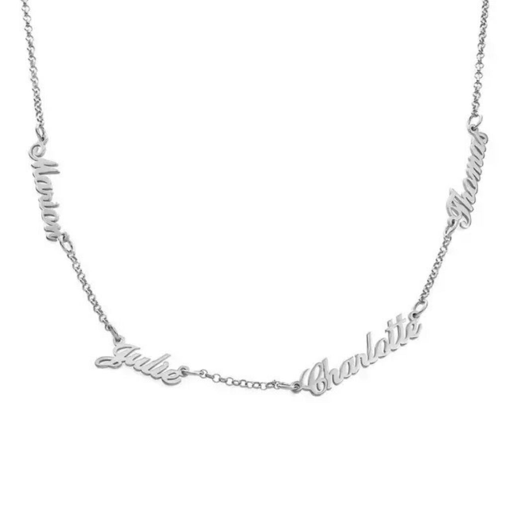 Silver necklace with name charms on a white background