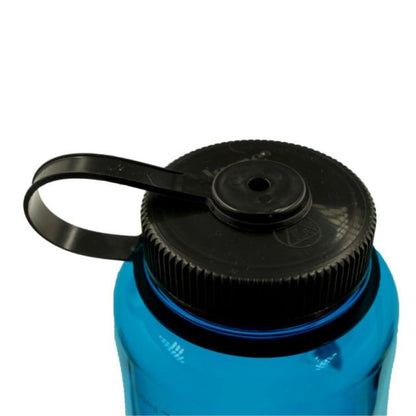 Close-up of a blue water bottle with a black cap on a white background