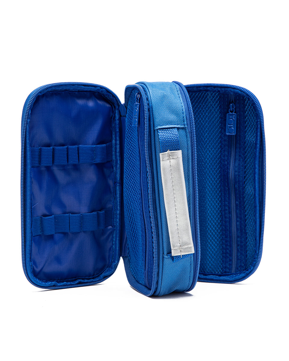 Blue travel case with open lid on a white background