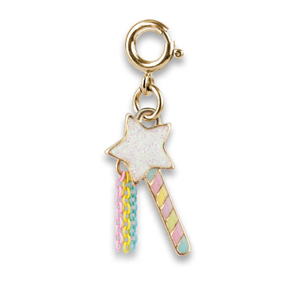 Gold charm with a star and colorful handle on a white background