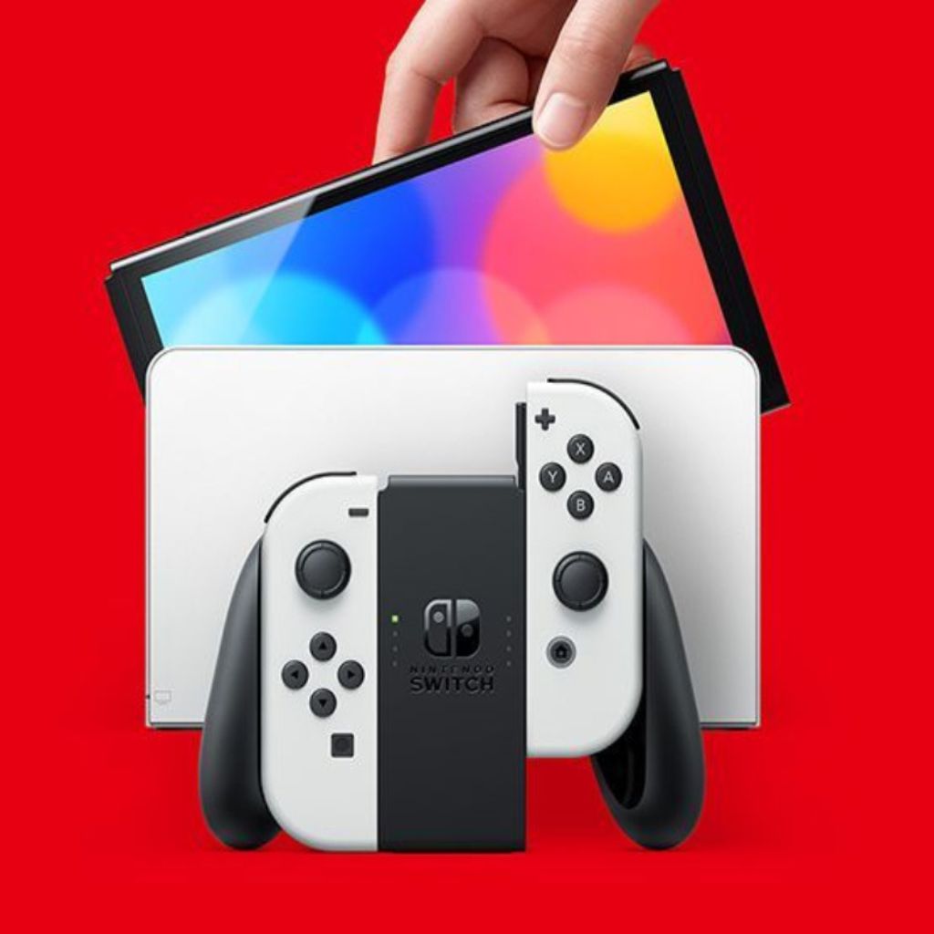 Nintendo Switch console with Joy-Con controllers on a red background