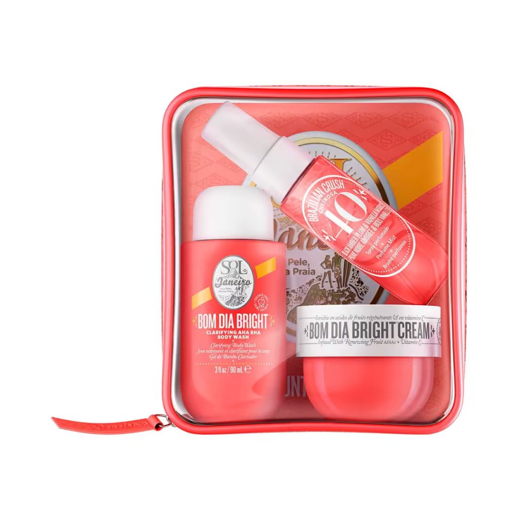 Set of skincare products in a red case on a white background