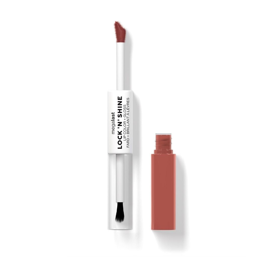 Lip gloss with applicator on a white background