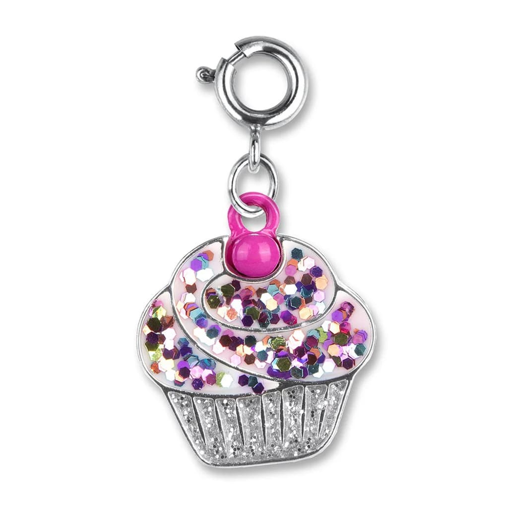 Cupcake-shaped charm with glitter and rhinestones on a white background