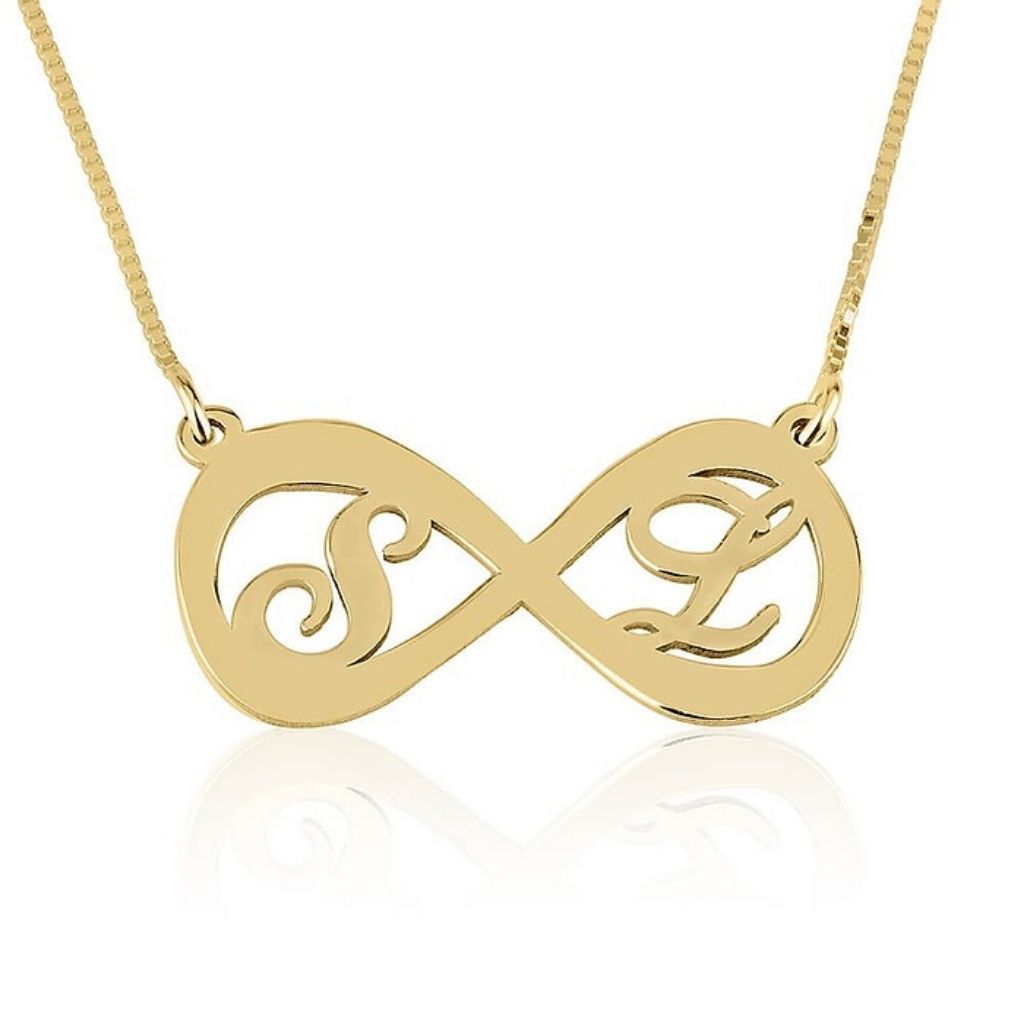 Gold infinity necklace with 'S' and 'L' initials on a white background