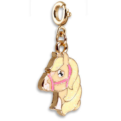 Gold horse charm with pink bridle on a white background