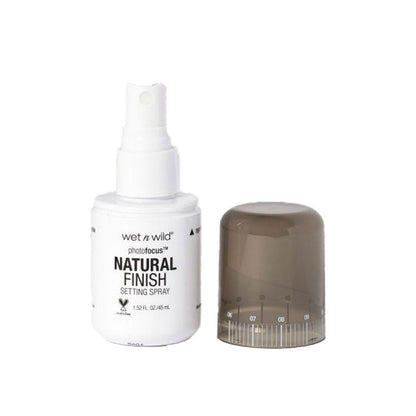 Wet n Wild Natural Finish setting spray bottle with cap on a white background