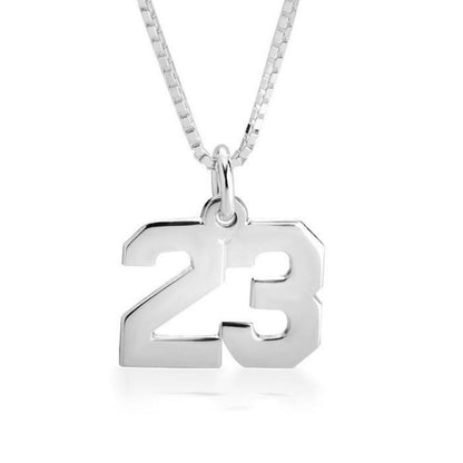 Silver necklace with a '23' pendant on a white background