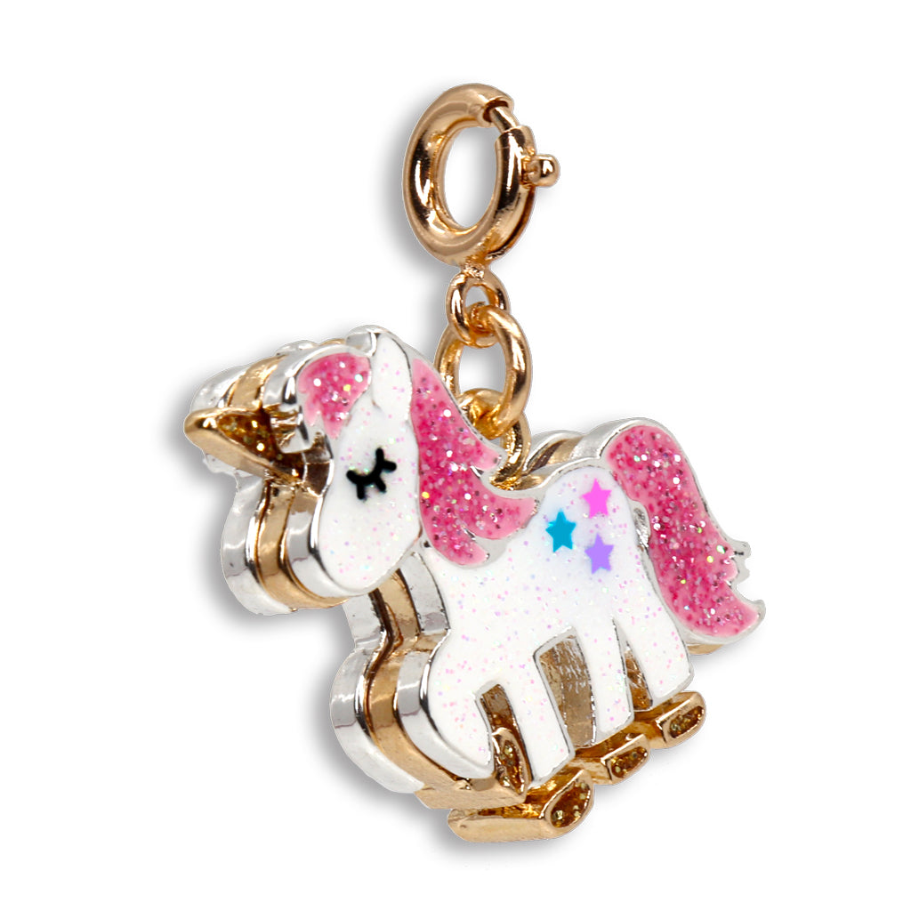 Unicorn charm with pink glittery accents on a white background