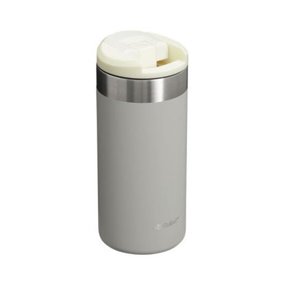 Gray insulated travel mug with a white lid on a white background