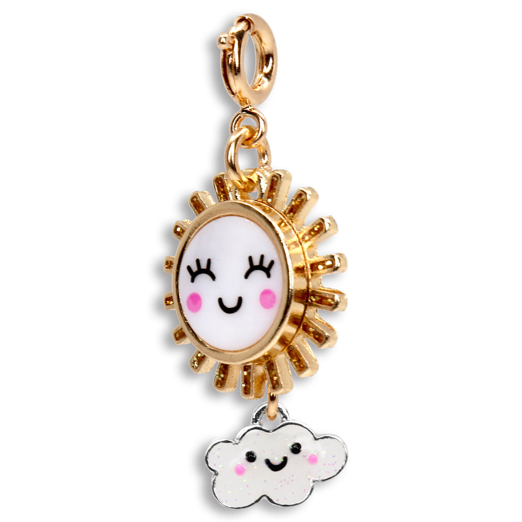 Sun and cloud charm with gold border on a white background