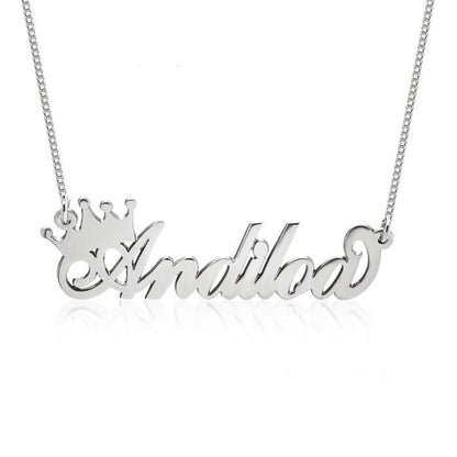Silver name necklace with a crown design on a white background