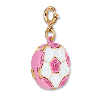 Pink and white soccer ball charm with gold accents on a white background