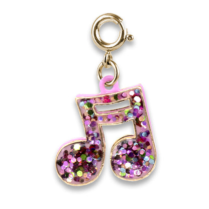 Glittery music note charm with gold border on a white background