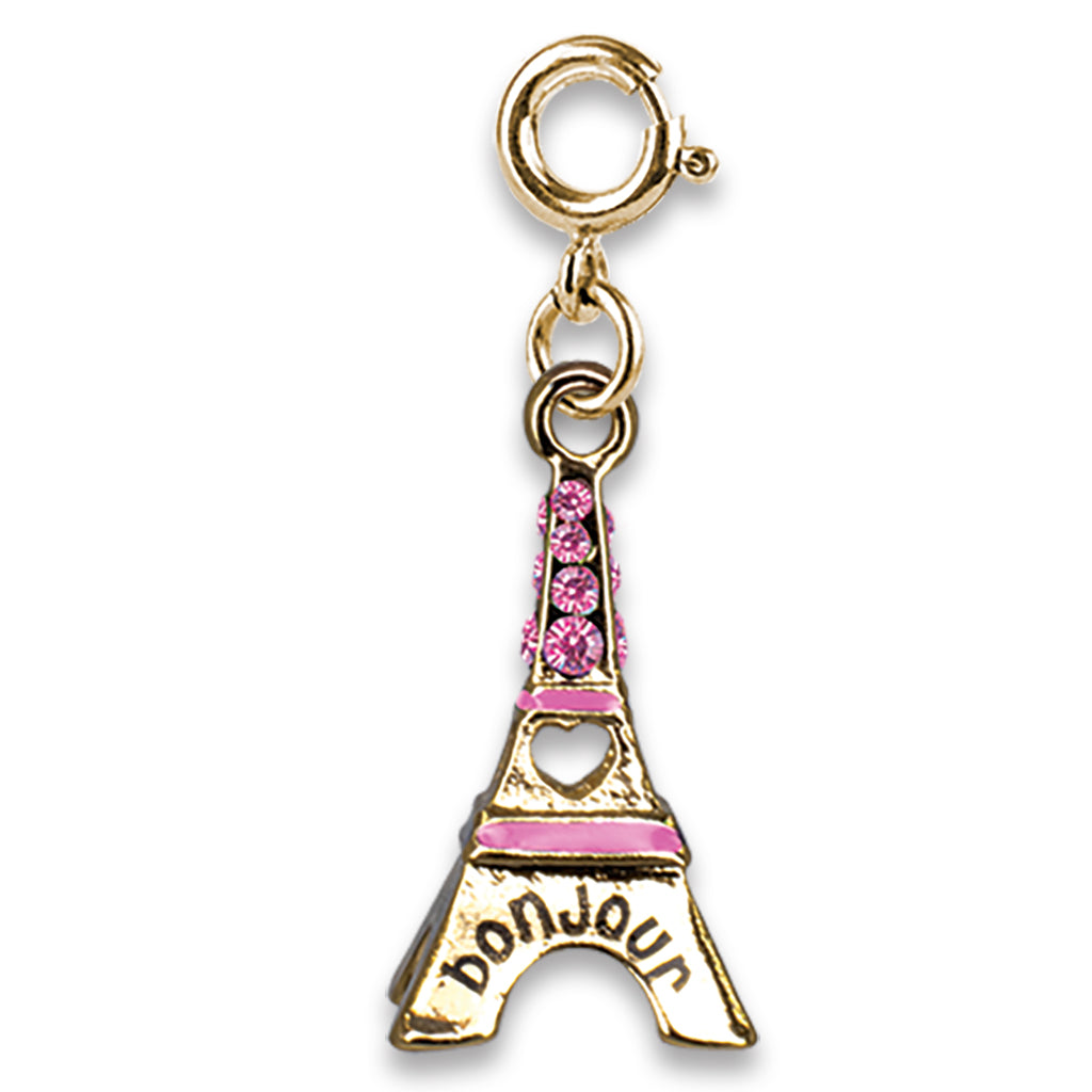Gold charm shaped like the Eiffel Tower with pink accents on a white background