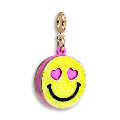 Emoticon charm with pink hearts and a smile on a white background