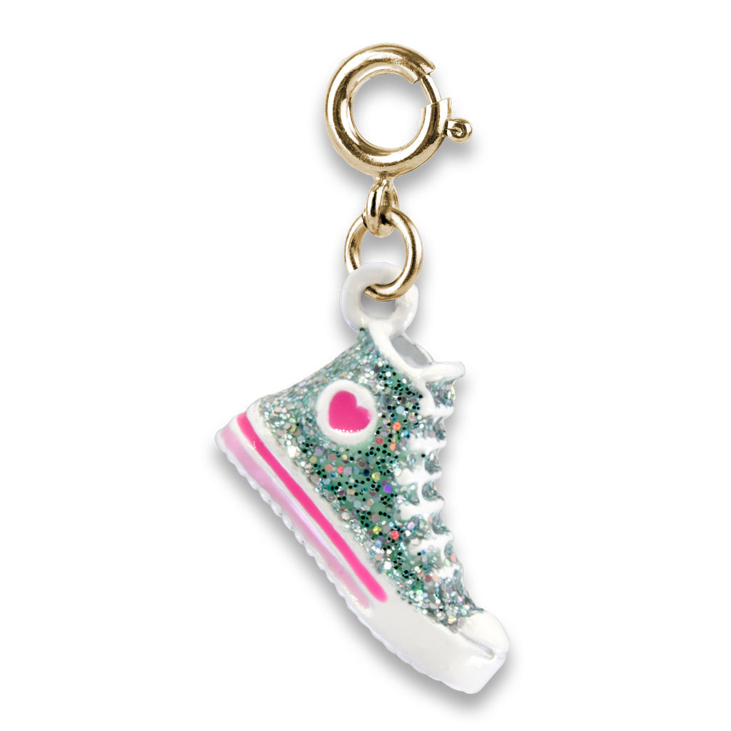 Glittery high-top sneaker charm with pink heart on a white background