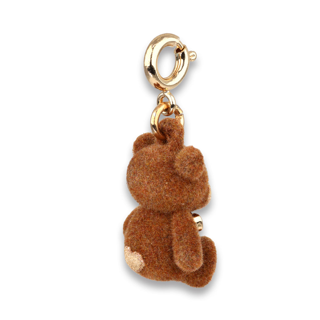 Brown plush bear charm with gold clasp on a white background