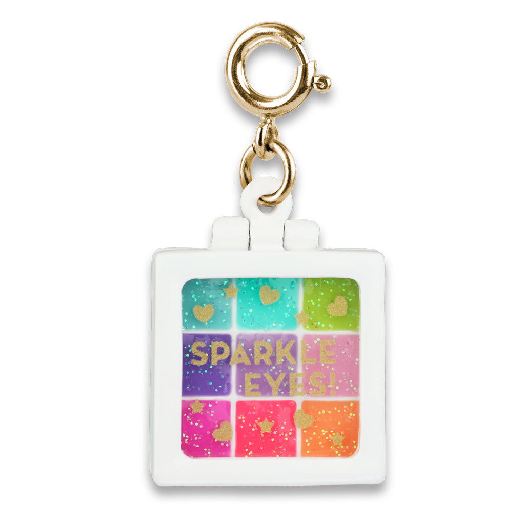 Square charm with colorful design and 'Sparkle Eyes' text on a white background