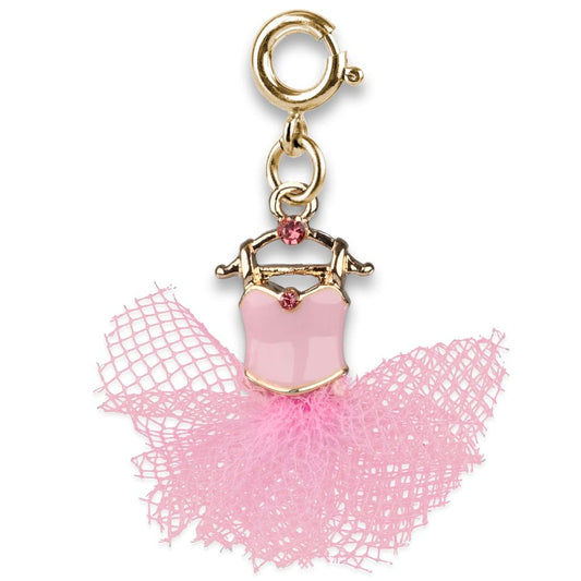 Pink ballerina charm with gold details on a white background