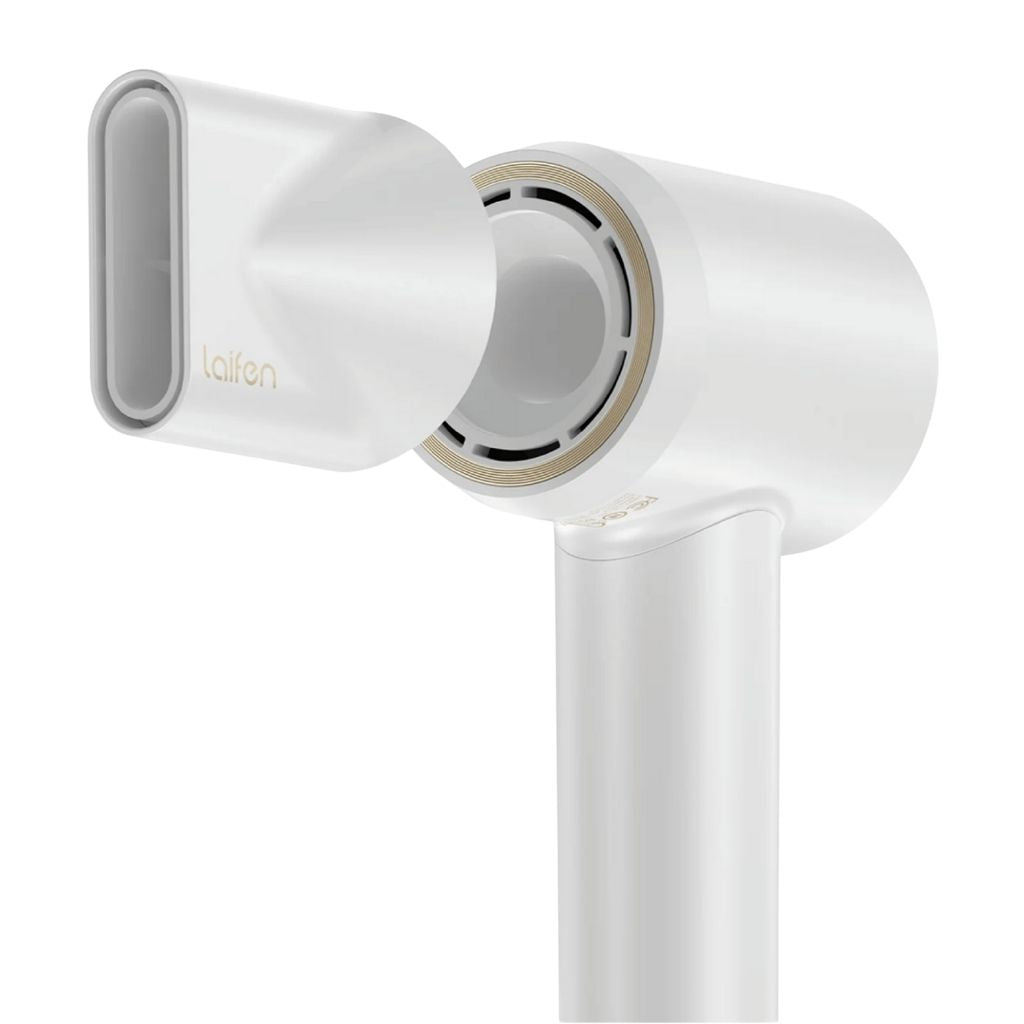 White hair dryer with gold accents on a white background