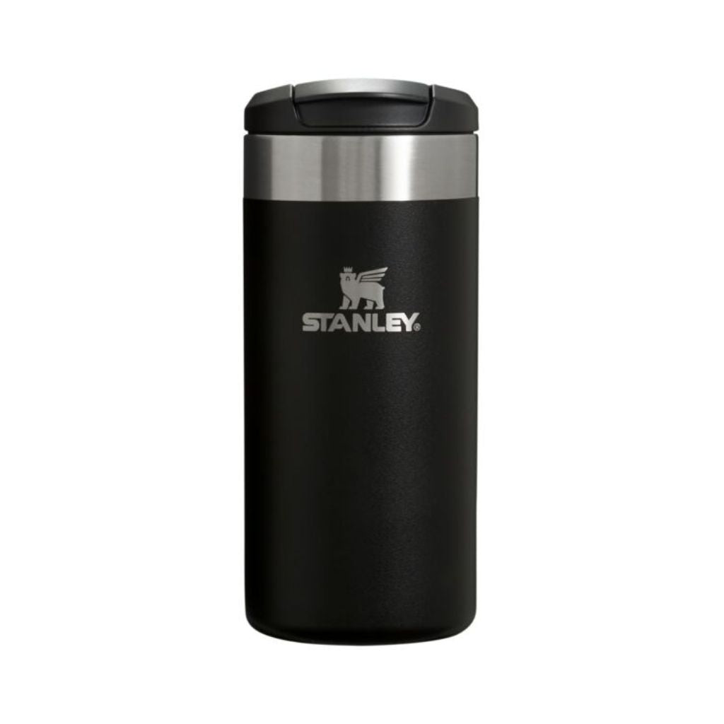 Black Stanley tumbler on a white background