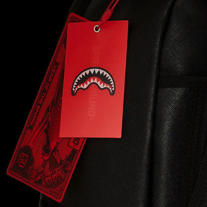 Black leather jacket with a red tag featuring a shark logo on a black background