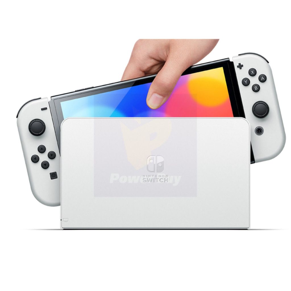 Hand holding a Nintendo Switch console with colorful display on a white background