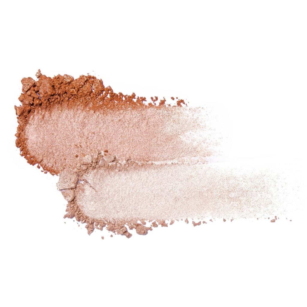 Close-up of brown and beige makeup powder on a white background