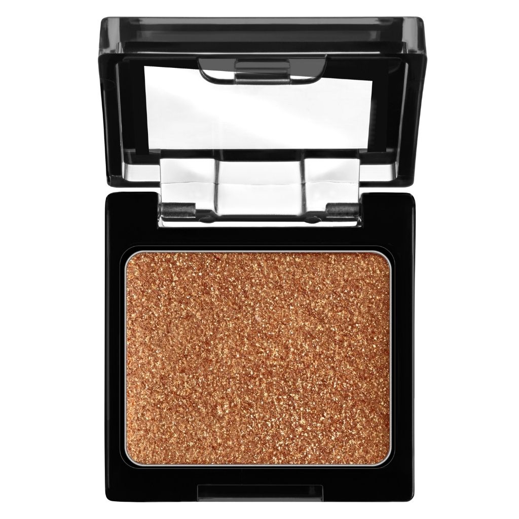 Compact eyeshadow with a glittery brown shade in a black case on a white background
