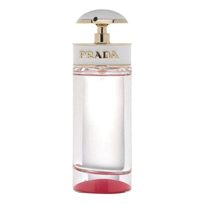 Prada perfume bottle with a gold cap on a white background