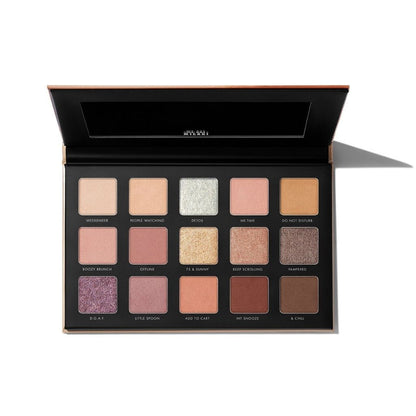 Makeup palette with various shades on a white background
