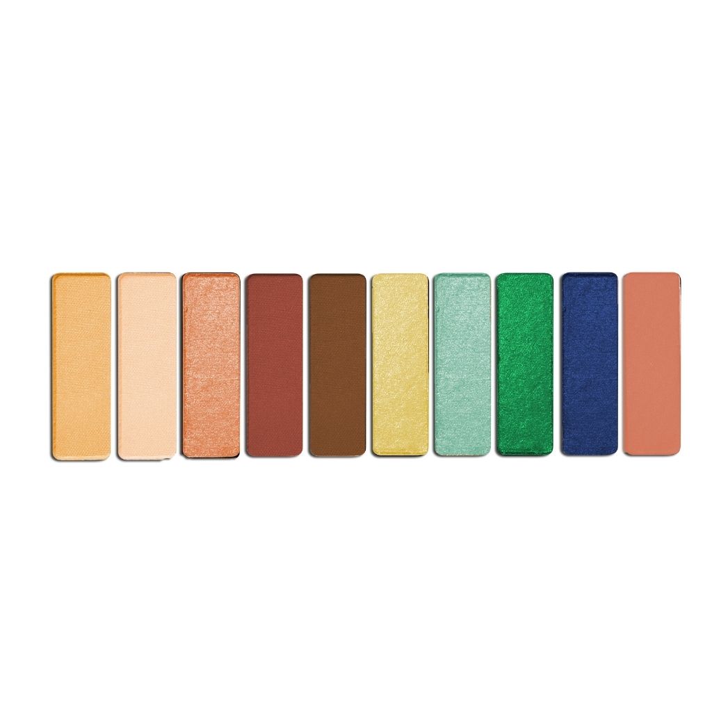 Row of colorful eyeshadow pans on a white background