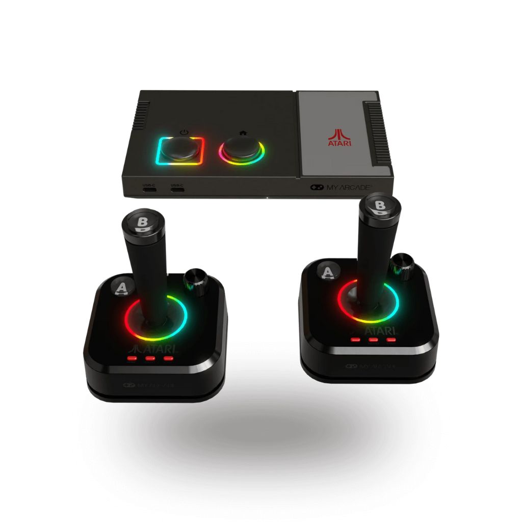 Atari gaming console with two controllers on a white background