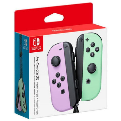 Nintendo Switch Joy-Cons packaging with purple and green controllers on a white background