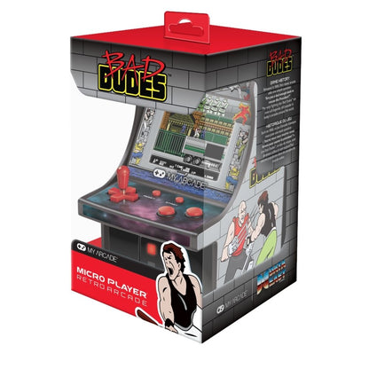 Retro arcade machine toy with 'Bad Dudes' branding on its packaging