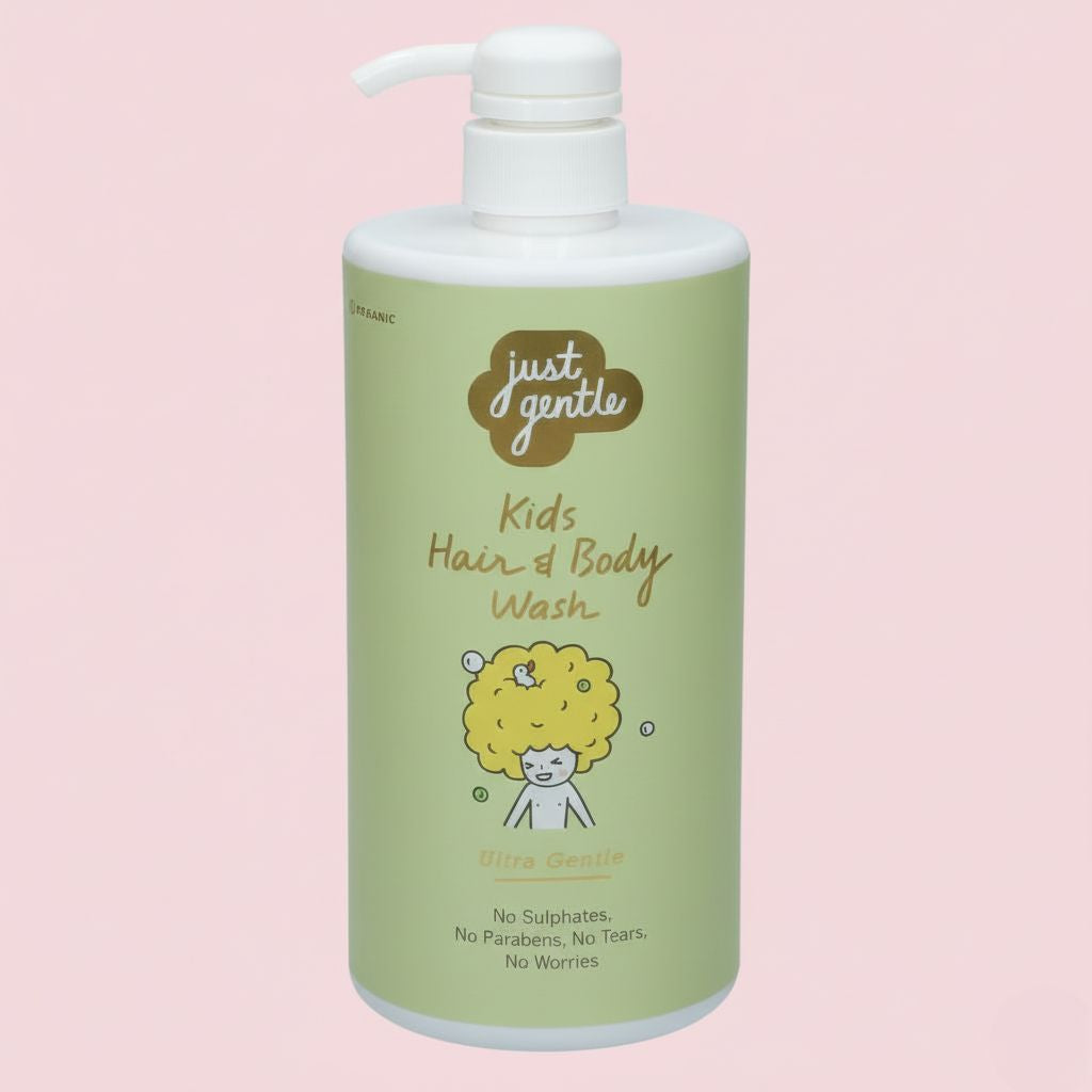 Green bottle of 'just gentle' Kids Hair & Body Wash on a pink background