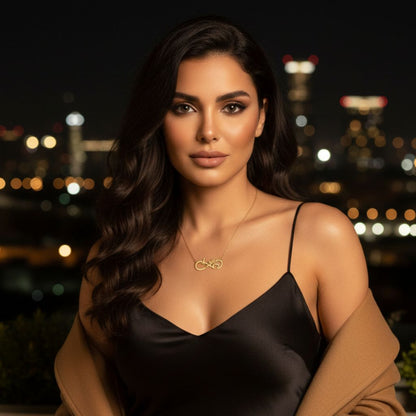 Woman wearing a black dress with a cityscape in the background