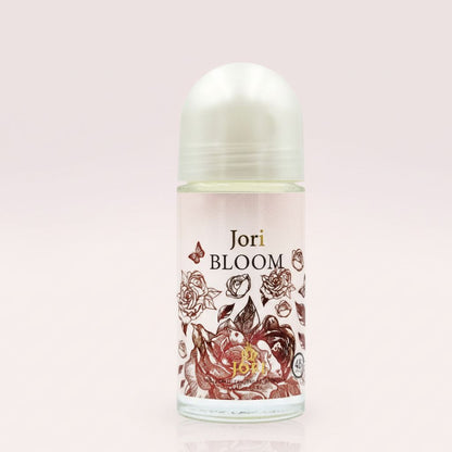 Deodorant bottle with floral design and 'Jori Bloom' branding on a light pink background