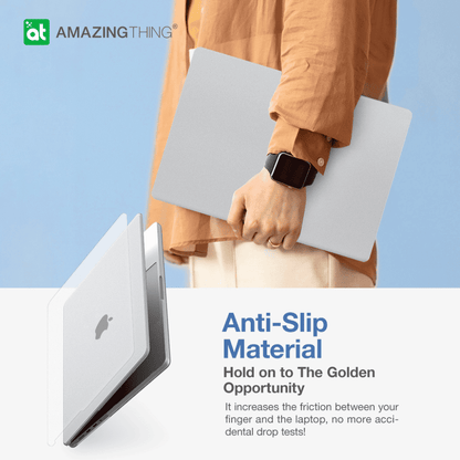 Person holding a laptop with anti-slip material, featuring the 'Amazing Thing' brand.